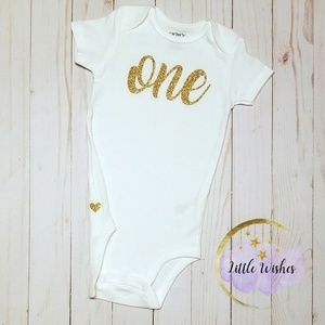 Baby girl bodysuit one gold glitter